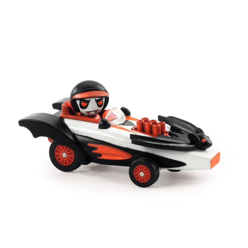 Black racing car toy with red accents and driver figure on white background