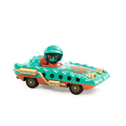 Turquoise toy car with flame design, driver figure, and golden exhaust pipes on white background