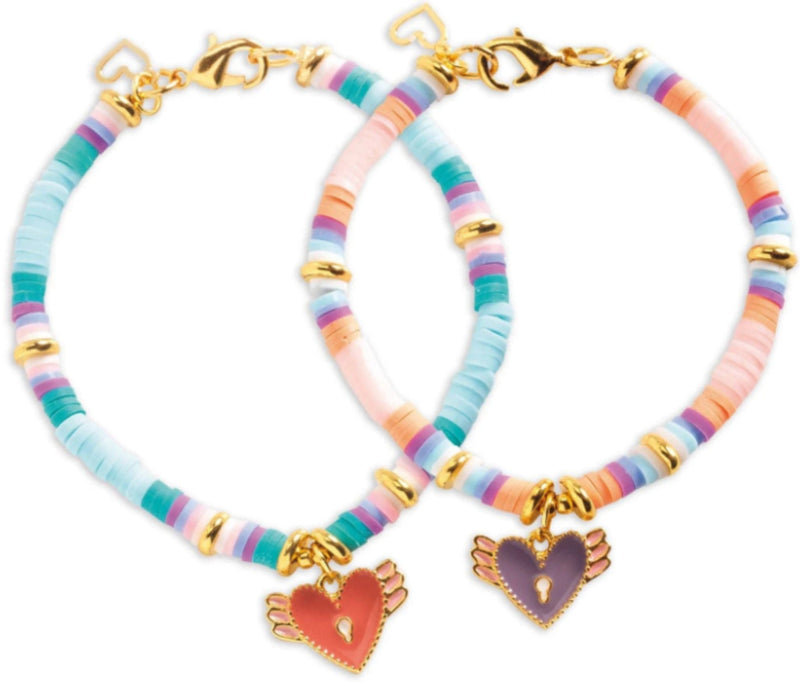 Two beaded bracelets with gold-tone hardware and heart charms, displayed on a clean white background. One bracelet features a red broken-heart charm, and the other features a purple heart charm.