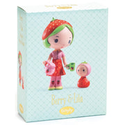 A boxed collectible figurine set from Tinyly, featuring Berry & Lila. The packaging is a light mint green box with a subtle diamond pattern, displaying illustrations of the two characters: one with strawberry-themed hair and clothing holding a pink teapot, and the other in a pink bonnet with a red strawberry dress.