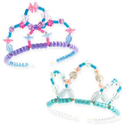 Two beaded tiaras for kids on a white background, one in pink, purple, and blue, and the other in turquoise, light blue, and white with shell-shaped beads.