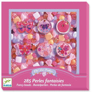 A pink DJECO jigsaw puzzle box featuring a colorful assortment of fantasy beads and embellishments under a pink border, with the text '285 Perles fantaisies' and the DJECO logo at the bottom.
