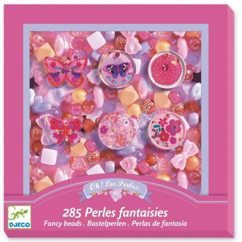 A pink DJECO jigsaw puzzle box featuring a colorful assortment of fantasy beads and embellishments under a pink border, with the text '285 Perles fantaisies' and the DJECO logo at the bottom.