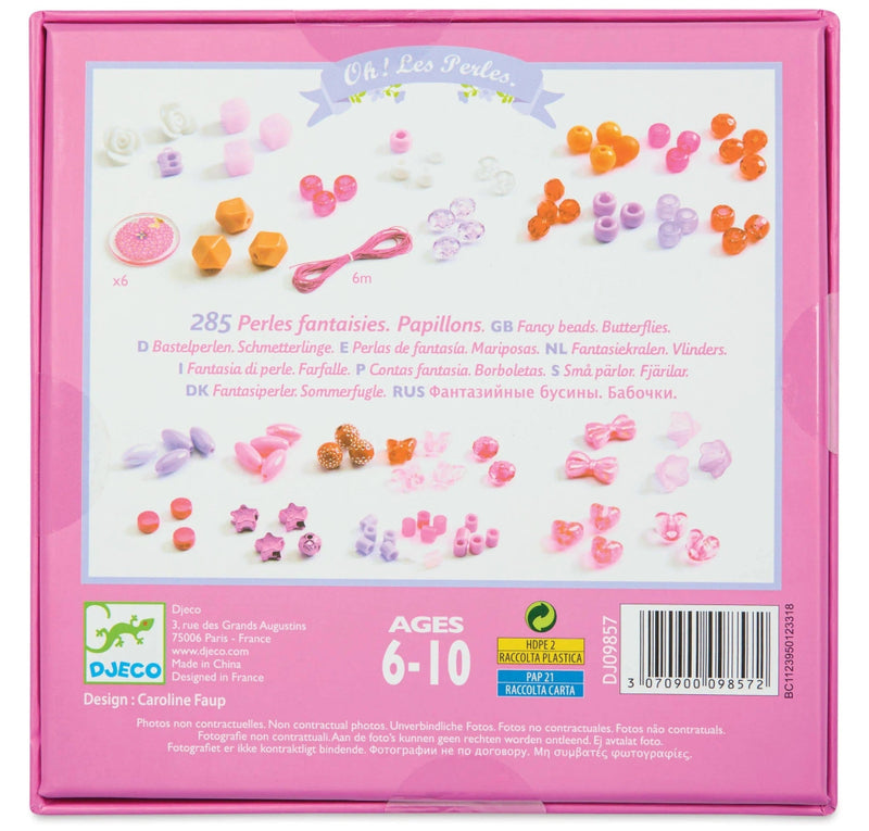 The back of a pink DJGO 'CH / Leo Perles' craft box, showing product details, included bead and bow pieces, age rating 6-10, and a barcode.