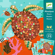Tortoise mosaic art set with colorful tiles and ocean-themed background, featuring DJECO branding.