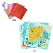 Underwater-themed metal paint-by-numbers art sets, featuring a stack of illustrated cards with a yellow spotted stingray and a fanned-out set of metallic sheets labeled 'METAL x 12' and 'x 4' on a white background.