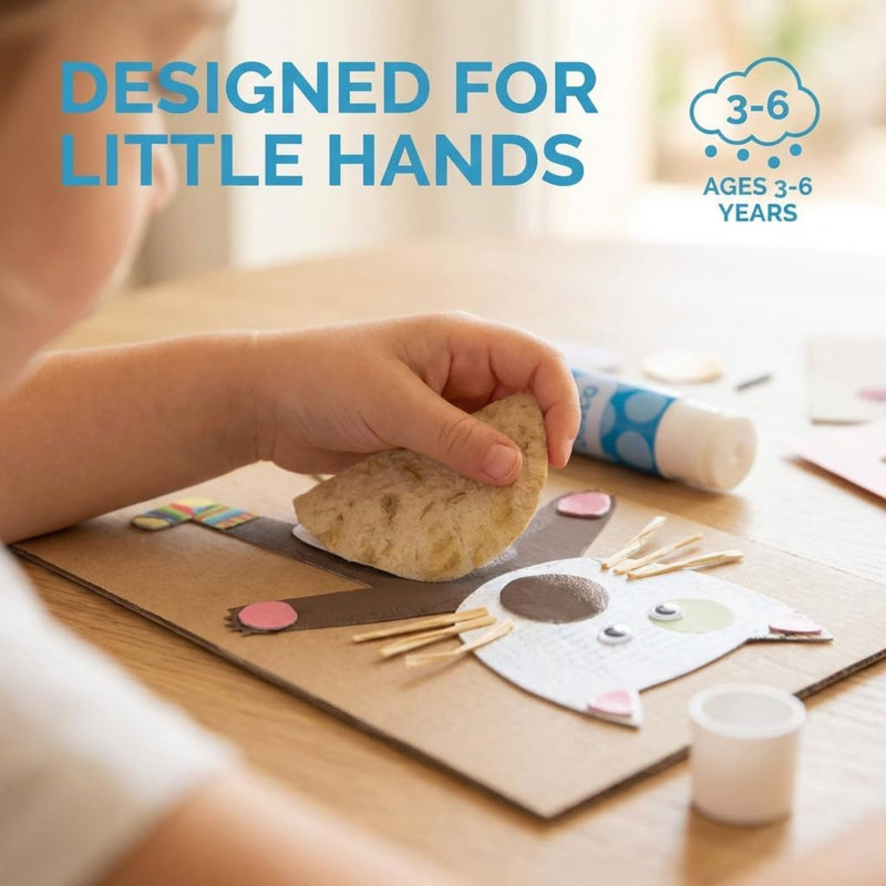 Child's hand holding a piece of play dough with craft materials on a table, labeled 'Designed for Little Hands' and 'Ages 3-6 years'.