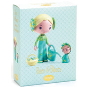Tinyly 'Flora & Bloom' doll set in its original packaging, featuring a blonde doll in green overalls holding a watering can and next to a small doll, on a white background.