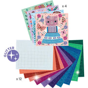 Djeco's craft kit showing a set of glittery patterned sheets and colored glitter sheets on a white background. The top sheet features a pink cat illustration with flowers and butterflies, with other floral patterned sheets fanned behind it.