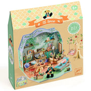 A boxed children's DIY wooden house toy set by Djeco, shown in its retail packaging on a white background. The box features a colorful printed illustration of a panda running through a detailed miniature room with shelves, bed, desk, and treehouse elements.