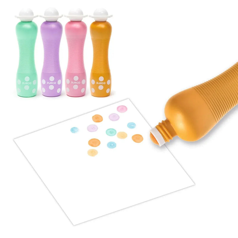 Four DJECO foam pearly markers in mint, purple, pink, and orange showing dots made on page on white background