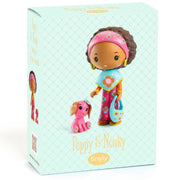 A boxed blind box toy featuring the characters Poppy & Nouky, shown on a clean white background. The packaging is light mint green with a subtle diamond pattern and displays illustrations of the doll and her pink dog.
