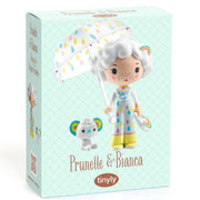Tinyly Prunelle & Bianca collectible doll in its original mint green patterned packaging box, holding a white umbrella with colorful raindrop patterns.