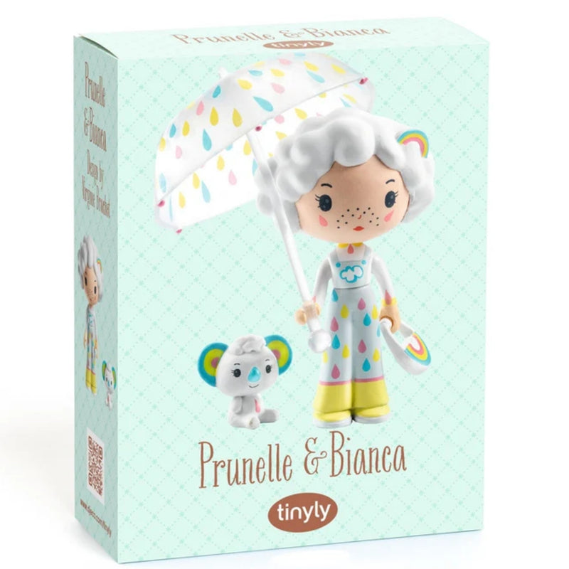Tinyly Prunelle & Bianca collectible doll in its original mint green patterned packaging box, holding a white umbrella with colorful raindrop patterns.