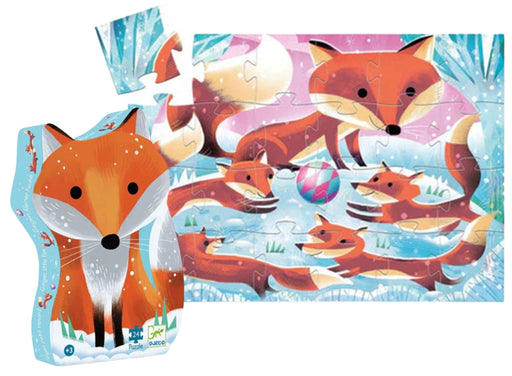 A children's jigsaw puzzle and its matching stand-up box packaging, both featuring an illustration of orange foxes in a snowy winter scene with pastel blue, pink, and white tones.