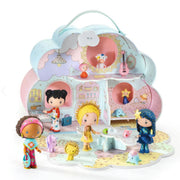 A pastel cloud-shaped dollhouse playset with a carrying handle, featuring multiple rooms, miniature furniture, and several small character dolls standing around it on a white background.