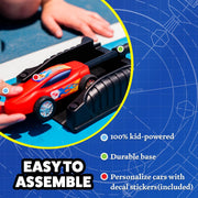 Child loading the air-powered car into its black stomp launcher.