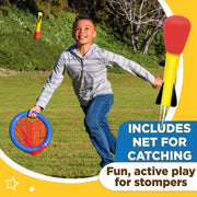 Child running with the net toward a foam-tipped rocket.