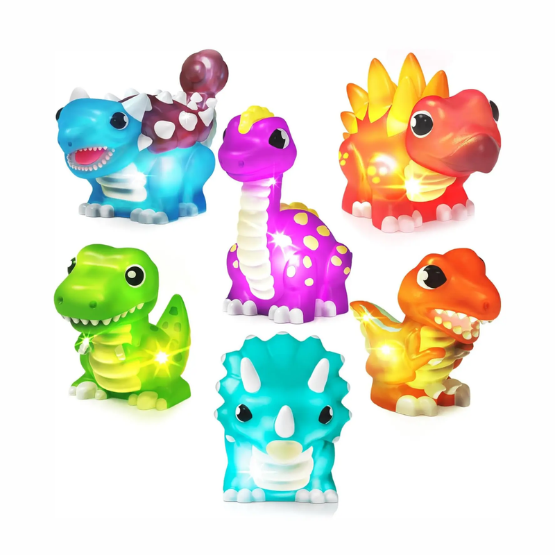 From TubWorks, colorful dinosaurs bath toys with LED lights on a white background.