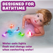 Child in a bathtub with colorful water-safe dinosaur lights text indicating bathtime use.