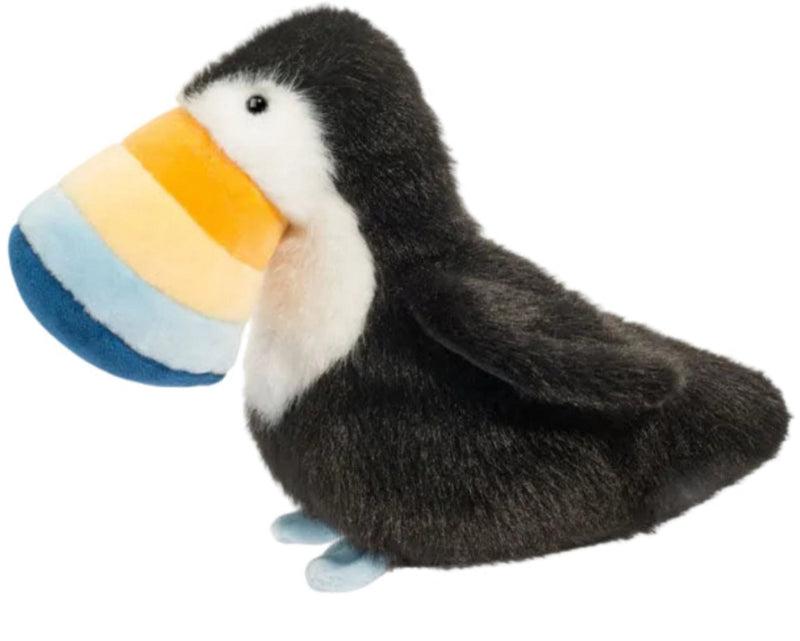 A plush toucan Muzzle with black fur, a white chest, and a large striped beak in blue, yellow, and white, shown on a plain white background.