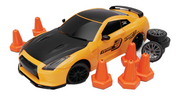 Orange and black Drift King RC car with traffic cones and spare tire wheels