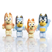 Four Bluey character bath squirter toys on white background