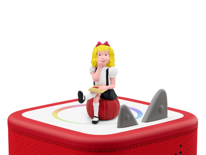 Tonie Eloise figurine sitting on red apple with Toniebox audio player