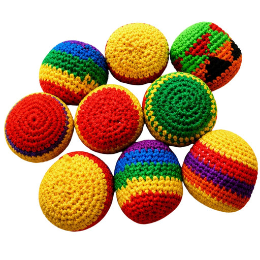 Colorful Hacky Sack crocheted balls on a white background