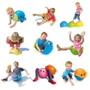 Children playing with Bilibo which are colorful plastic toys on a white background.