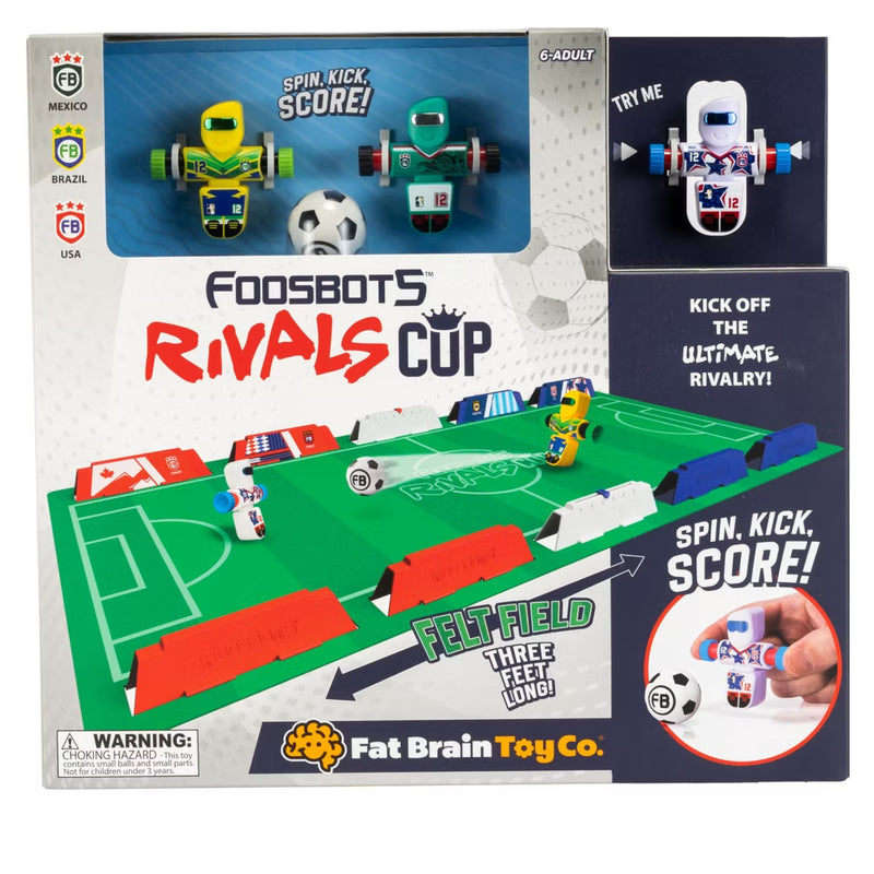 Boxed Fat Brain Toy Co. Foosbots Rivals Cup toy set shown on a retail package with a felt soccer field, small robot figures, and a demonstration inset of a hand spinning a ball.