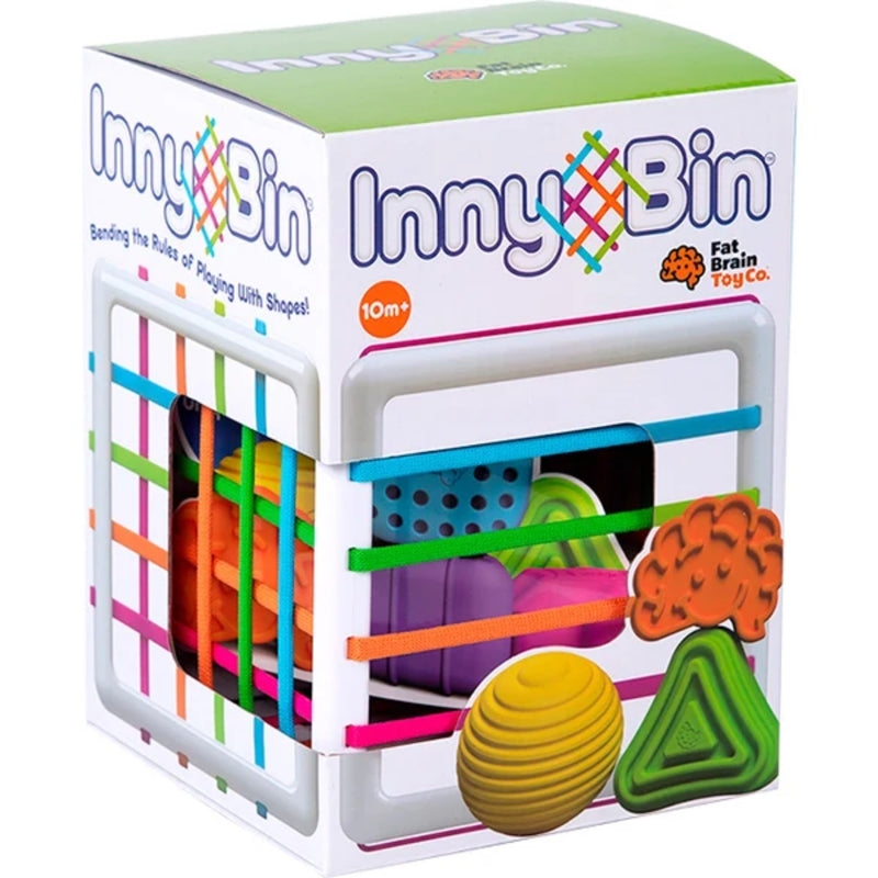 Inny Bin toy packaging box showing colorful peg-shaped play pieces inside a white and green box with the Inny Bin branding.