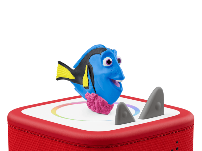 Blue Dory fish figurine on red Toniebox speaker with gray shark fins