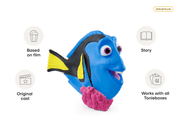 Blue Dory character Tonie figure with yellow fins on pink coral base with feature callouts