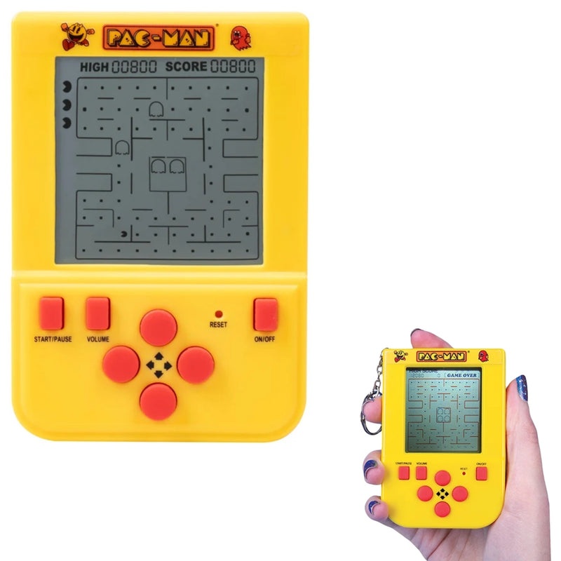 A bright yellow retro-style handheld Pac-Man game console shown on a white background, alongside a hand holding a smaller version of the same device with a keychain loop.