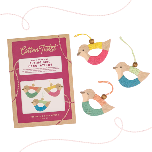 Cotton Twist craft kit with colorful bird thread-wrapped decorations on a white background.