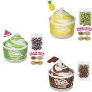 Three FroYo Dough ice cream cups shown on a white background with flavor graphics and included accessories: watermelon swirl, pineapple swirl, and chocolate chip swirl. Each cup includes a wooden spoon and small candy pieces, with flavor labels and ingredient illustrations around them.