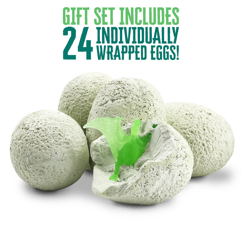 Glow-in-the-dark dinosaur eggs showing excavation with green glowing dinosaur figure inside