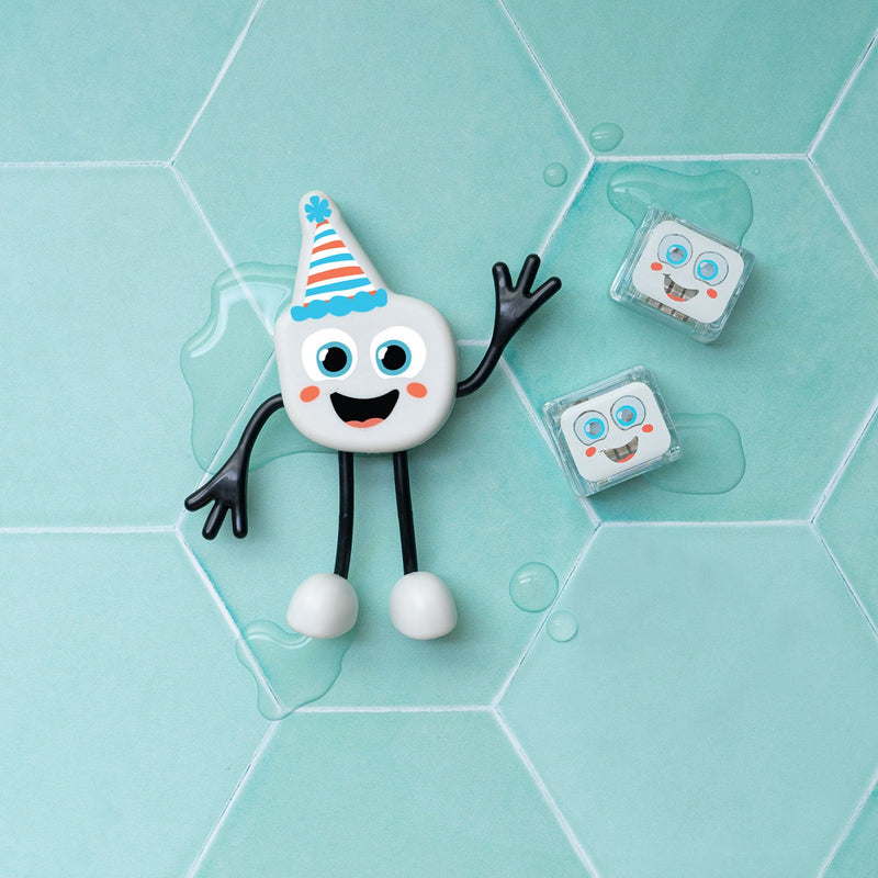 Glo Pals Party Pal character with party hat and ice cubes on hexagonal tiles