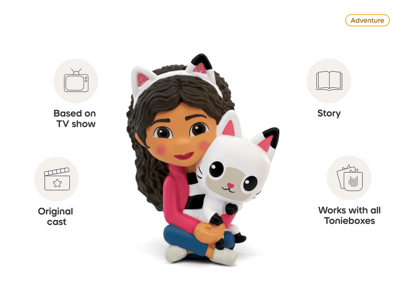Tonie figure showing girl character holding white cat with feature icons around them