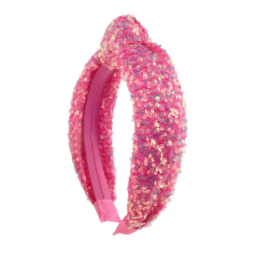 Pink sequined headband with knotted top design on white background