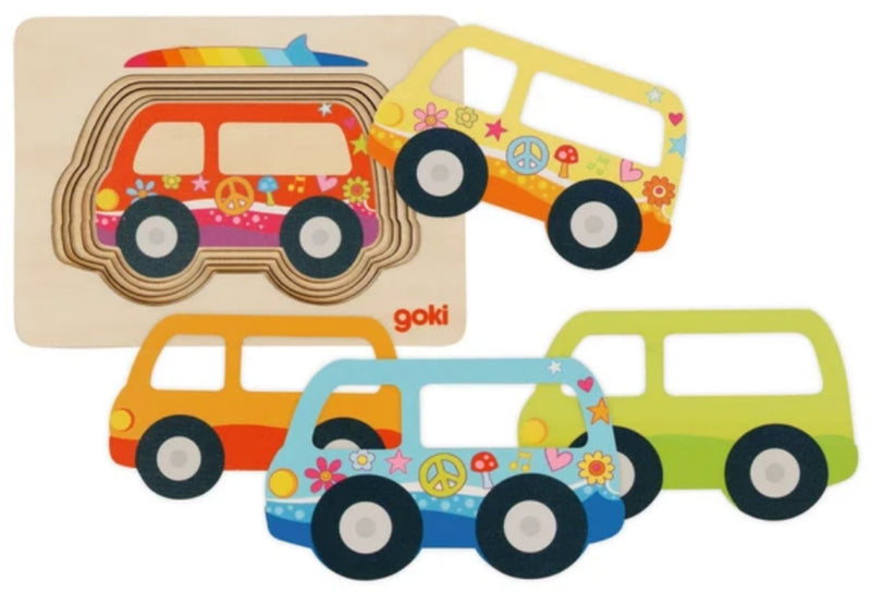 A set of colorful wooden toy cars and a matching wooden puzzle board on a plain white background. The brand name 'goki' is visible on the puzzle board.