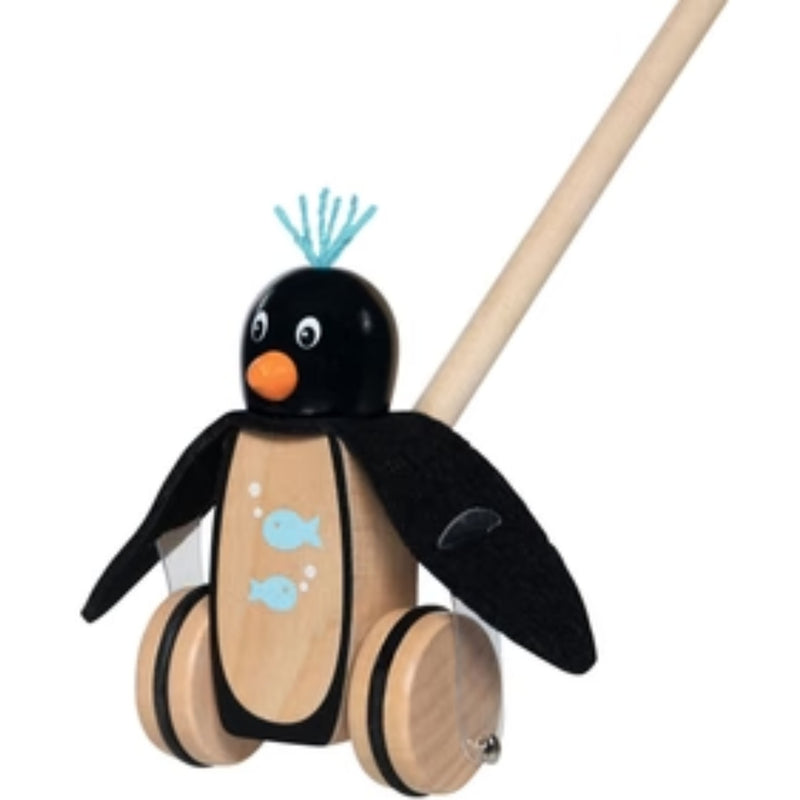 A wooden toy penguin walker with a natural wood body and wheels, a black felt head and wings, light blue painted fish and tuft, and a natural wood handle on a white background.