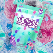 Packaging of Lil' Bursts mini bath bombs with colorful bath bomb design in the background.
