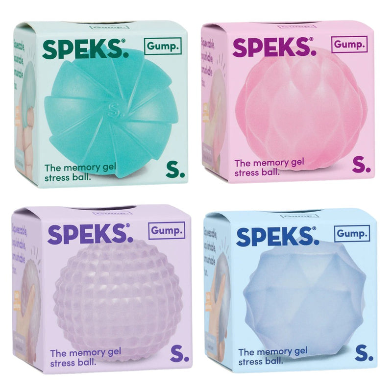 Four boxes of Speks Gump Surface memory gel stress balls in different colors (teal, pink, lavender, blue) with visible branding.