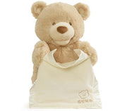 GUND animated Peek-A-Boo Bear plush holding a cream satin blanket