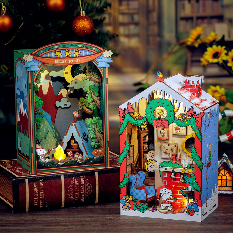 Peanuts Beagle Scouts diorama craft kits displayed in festive Christmas setting