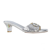Silver sequined slipper sandal with low heel and decorative flower detail