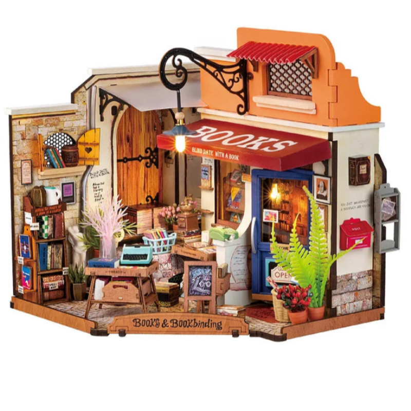 DIY Model of a miniature bookshop from HandsCraft with a 'Books' sign on a white background.