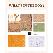 Collection of craft supplies with 'What's in the Box?' text on a beige background